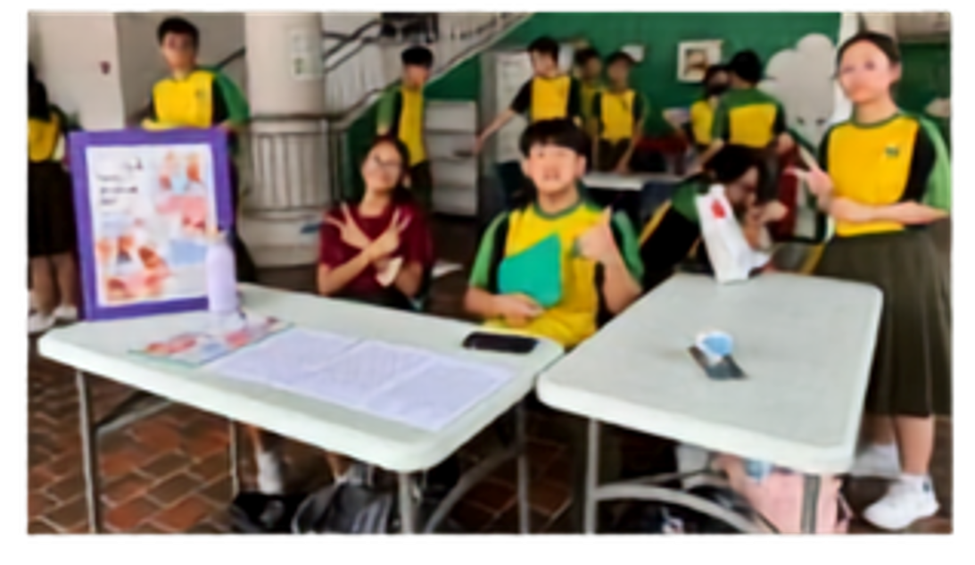 Secondary 4 students sharing health tips at the Khatib Square.